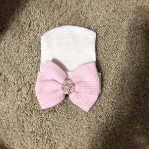 White newborn hat w/ pink & white stripped bow